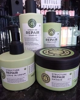 Repair by maria nila. The image shows the four products in the bundle. Green in colour with black lids