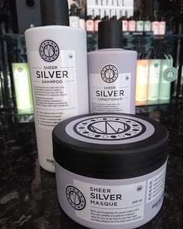 Sheer Silver by maria nila. Saver Bundle. The image shows the shampoo and conditioner bottle in pale grey with black lids and a jar of masque in front in pale grey with a black lid