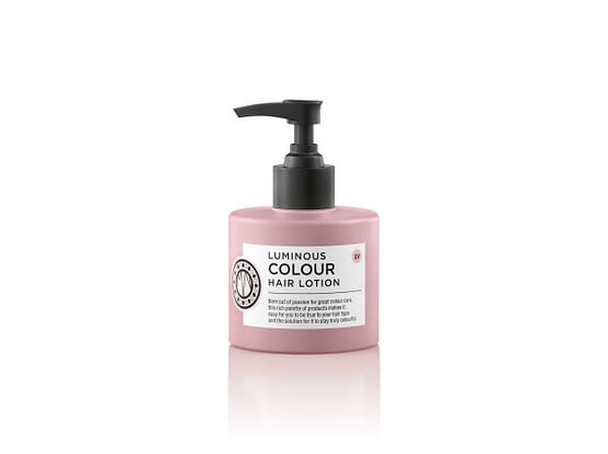 Luminous colour leave-in lotion by Maria Nila. The image shows a pink bottle with white label and black pump action applicator top.